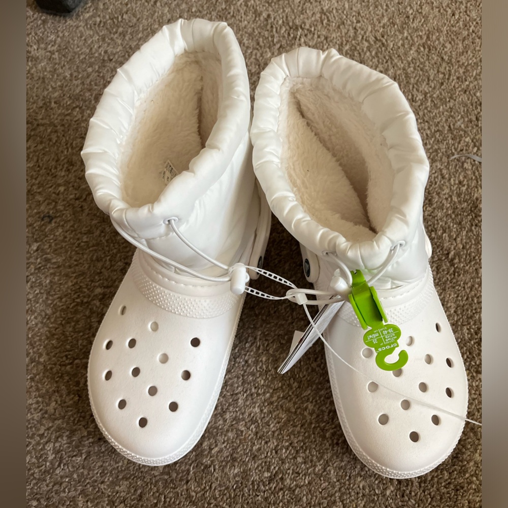 Crocs boots. Warm and cozy inside. Brand new. Size 7 in men / 9 in women